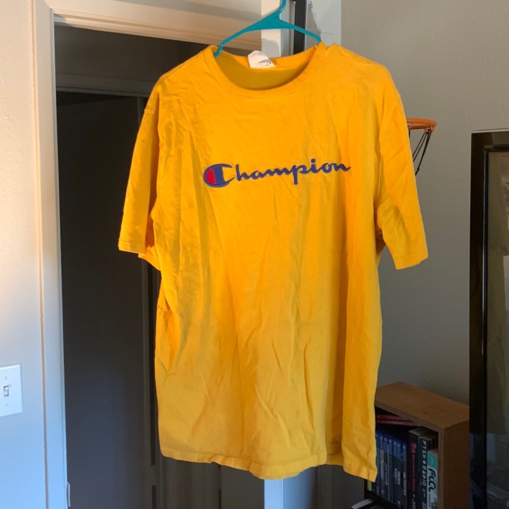 Yellow champion tee in fair condition